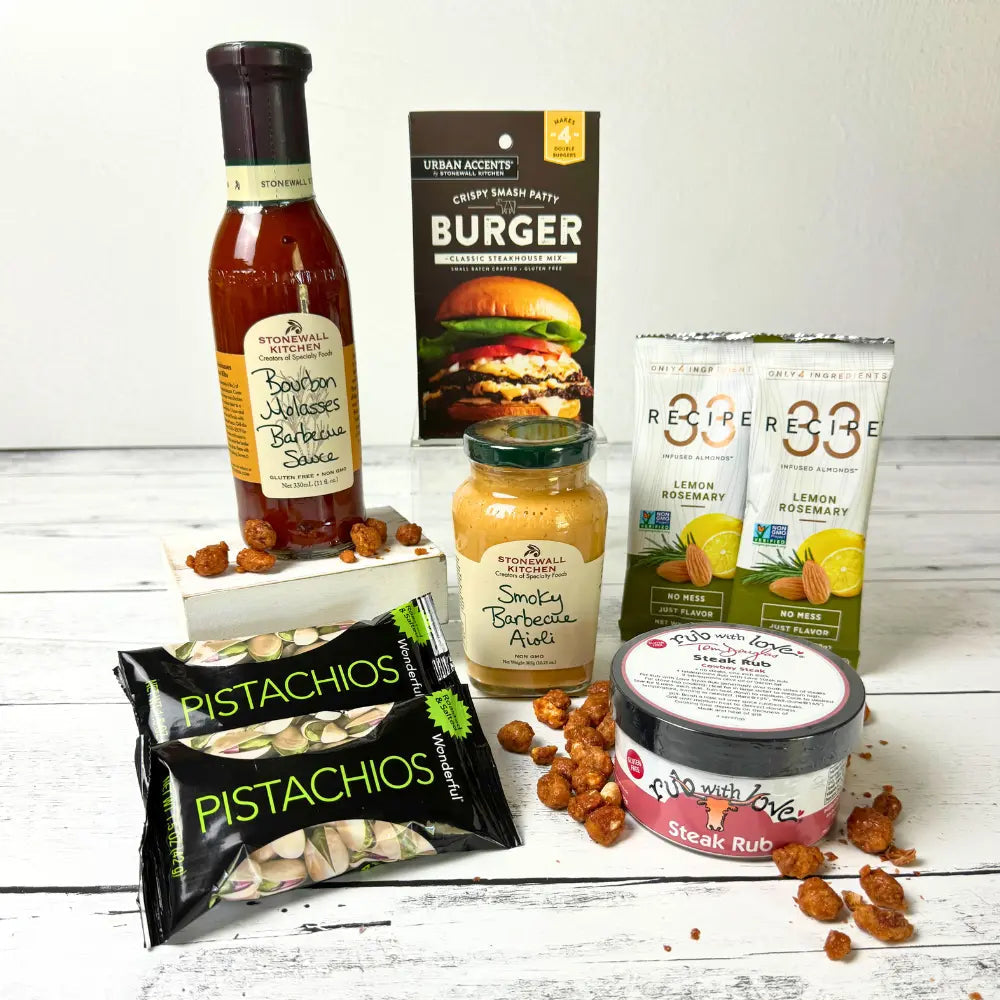BBQ Master gift basket featuring bbq sauce, smoky barbecue aloli, steak seasoning, infused almond, burger seasoning and pistachios.  Apple Blossom Gift Baskets