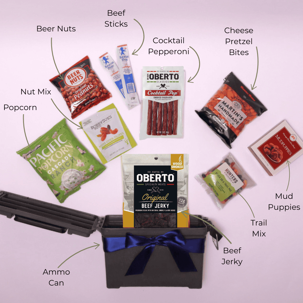 A top-down view of a men's snack gift basket displayed neatly, featuring beef jerky, nuts, popcorn, and savory snacks—perfect for a Father's Day gift, housewarming, or man cave essential.
