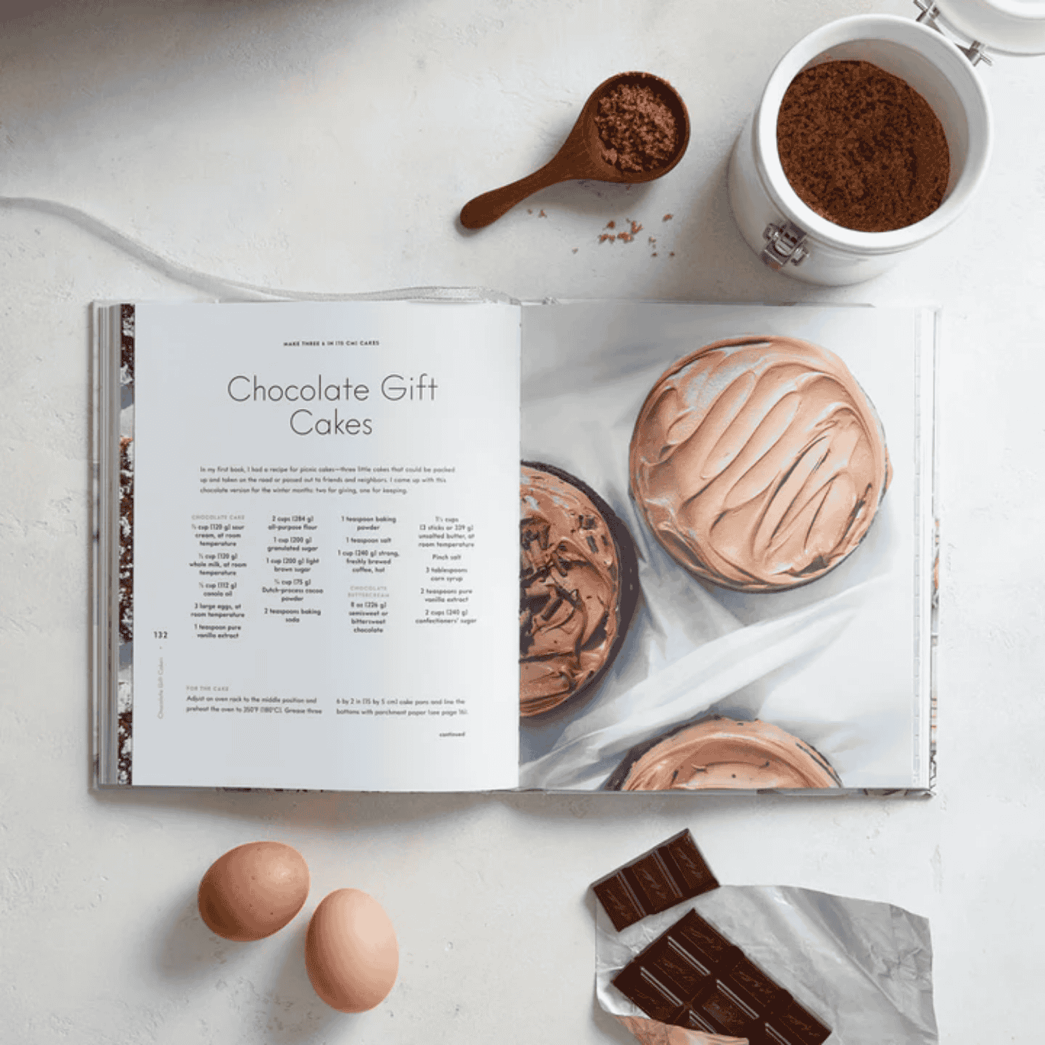 Baking For The Holidays cook book open to an example recipe of chocolate gift cakes