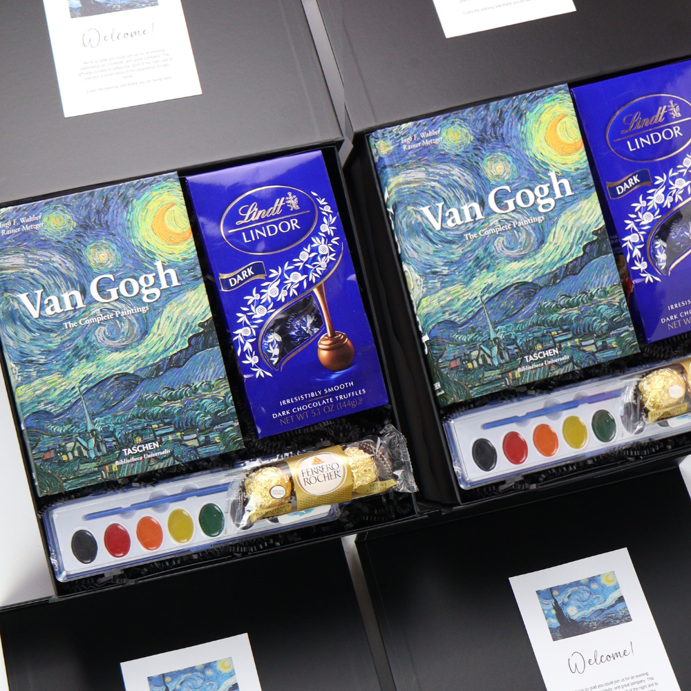 Lindt Van Gogh chocolate set with art-themed packaging on a black surface.