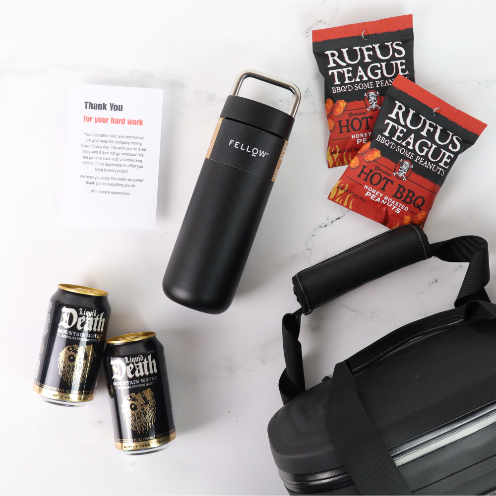 Black insulated bottle, cans of 'Death by Death', 'Rufus Teague' peanut bags, and a black carrying case on a white surface.