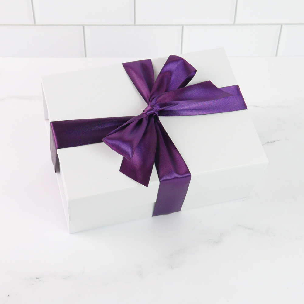 Ready-to-gift wild huckleberry breakfast basket with purple ribbon