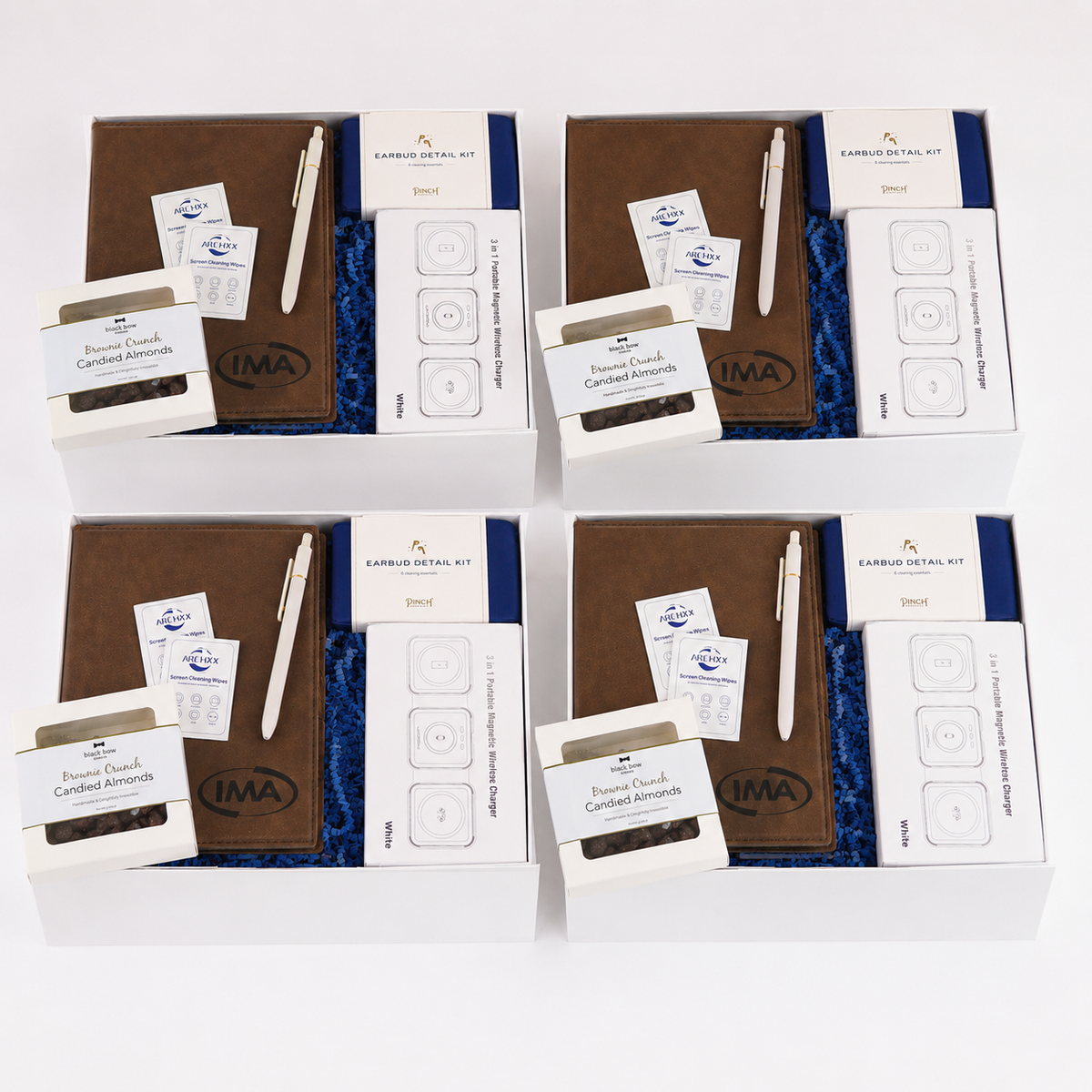 Set of IMA car care products including a pen, box, and small containers on a white background